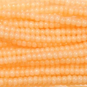 8/0 Czech Seed Bead, Waxy Apricot Opal Tint**