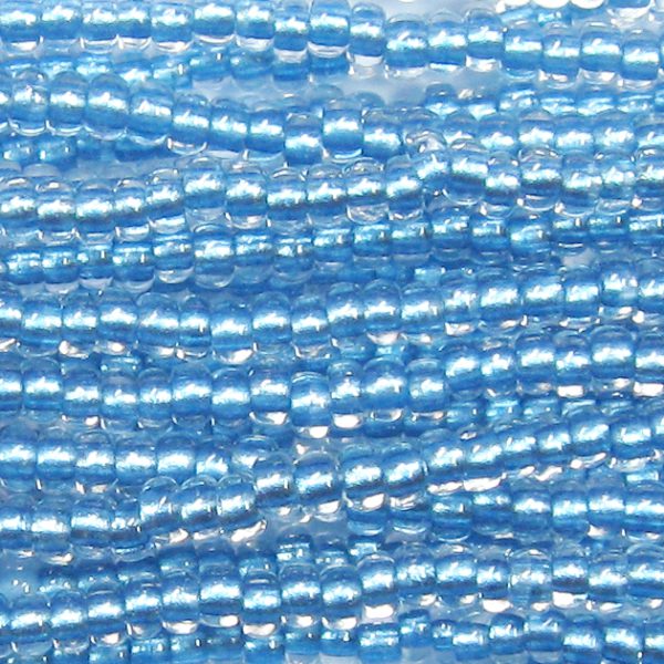 6/0 Czech Seed Bead, Metallic Aqua Tint Lined Crystal