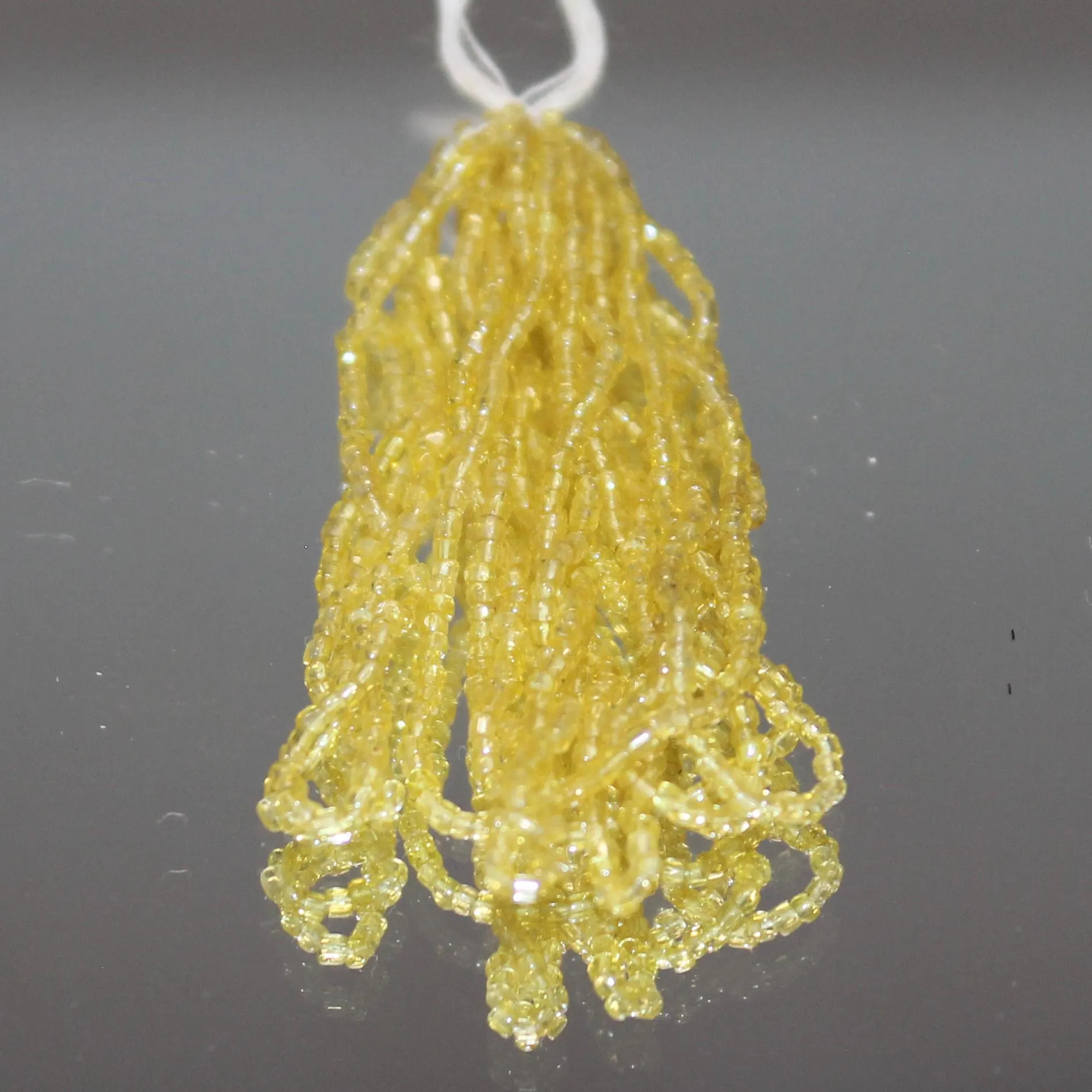 16/0 Vintage Micro Three Cut Transparent Jonquil Luster hank