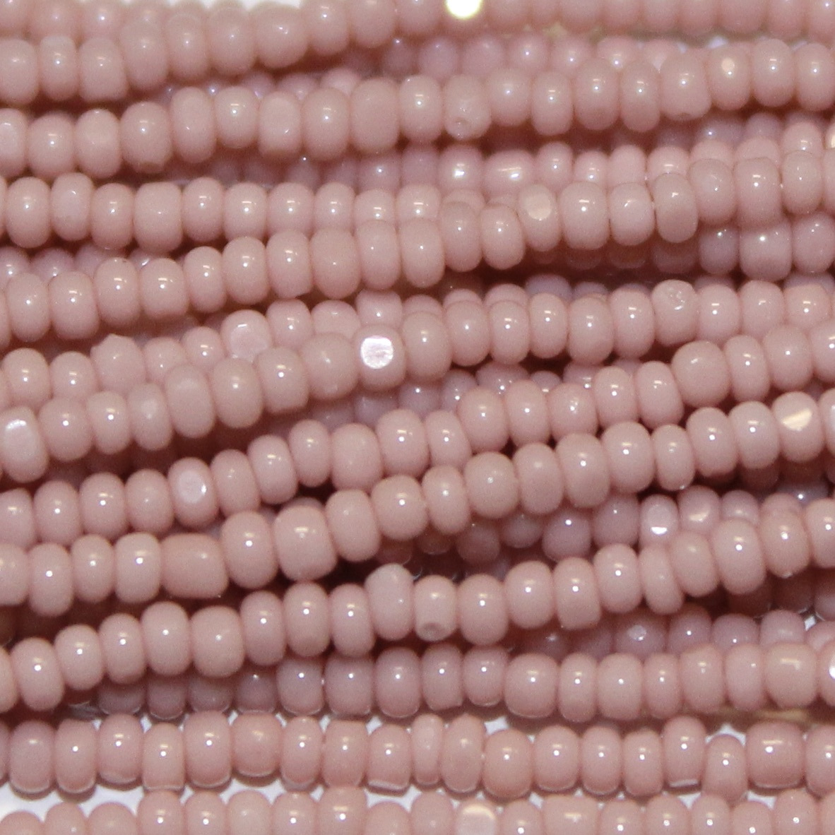 charlotte true cut glass czech seed bead opaque true light cheyenne pink