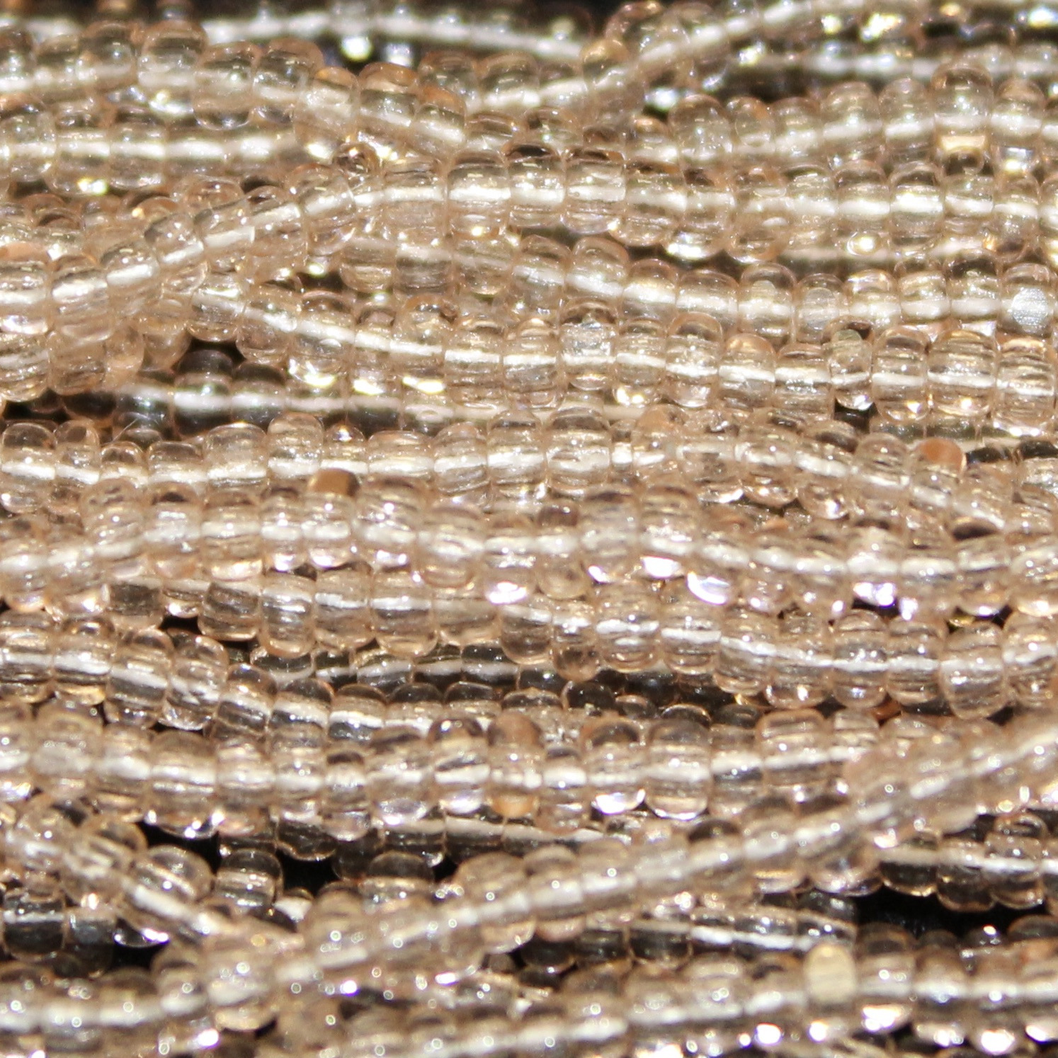 Charlotte Cut Transparent Light Rose Glass seed beads